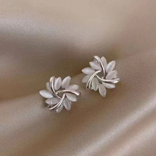 Rotating Flower Cat Eye Sun Ear Studs