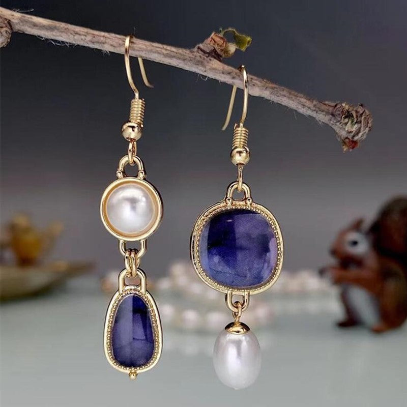 Asymmetrical blue and purple agate inlaid pearl earrings