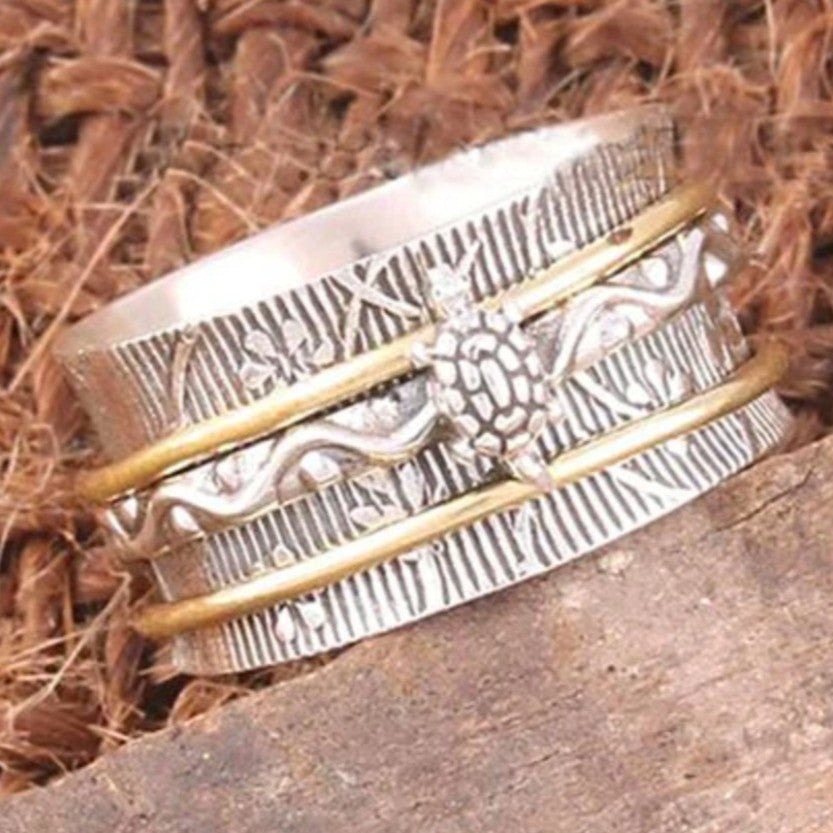 Rotating Dual-Tone Ring