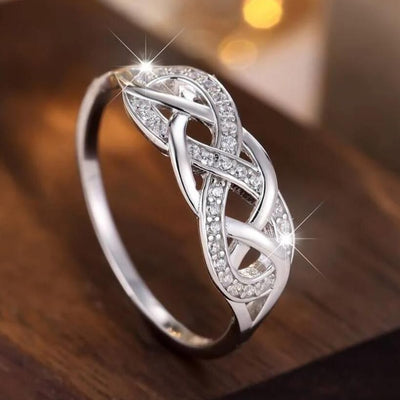 Twist Cross Hollow Zircon Ring